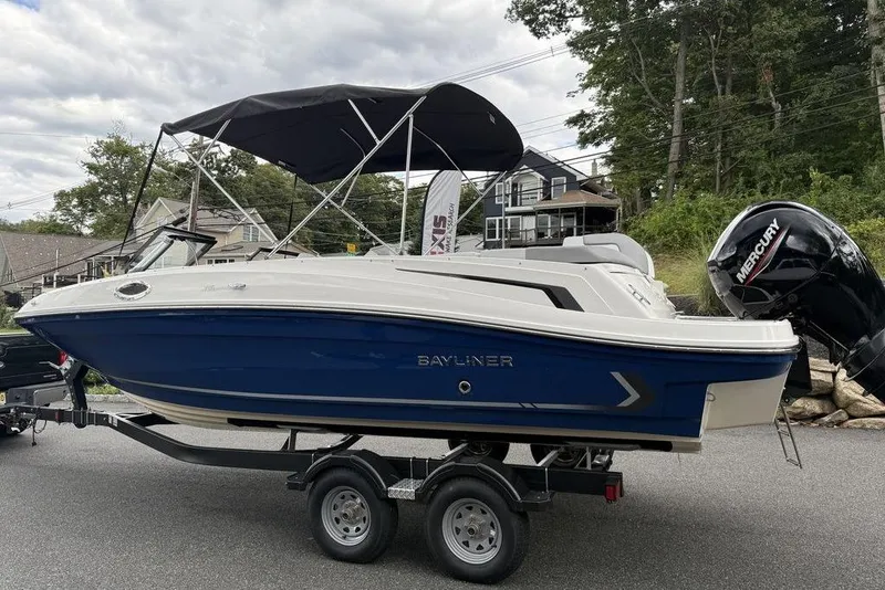 Slide: The Image of 2026 Bayliner VR6 Bowrider OB with Mercury outboard engine on trailer. - 12