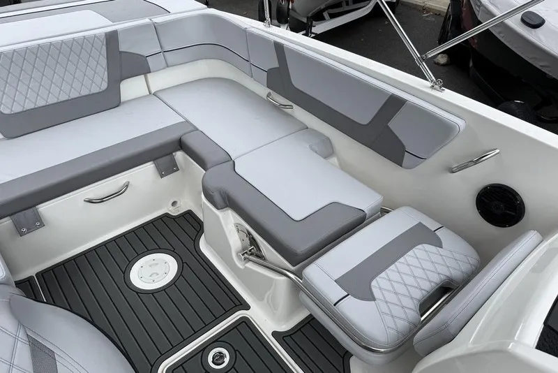 Slide: The Image of 2026 Bayliner VR6 Bowrider OB interior with gray seating and modern design. - 4