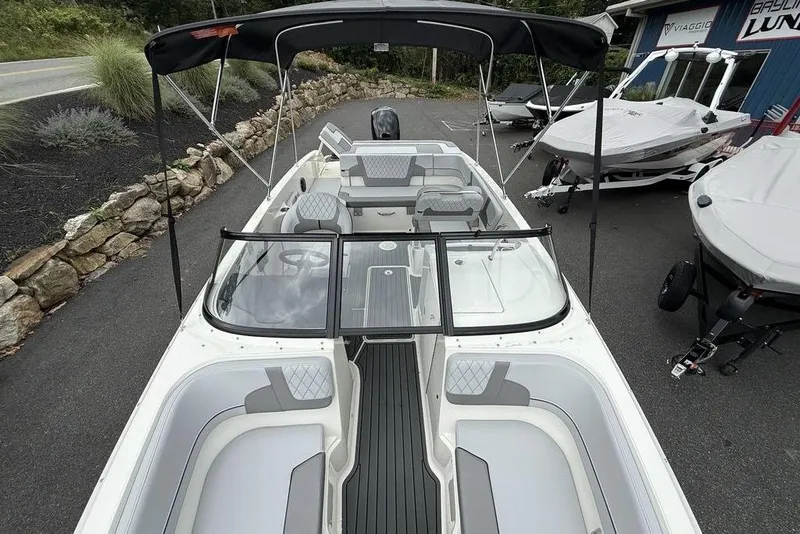 Slide: The Image of 2026 Bayliner VR6 Bowrider OB with sleek design and spacious seating. - 9