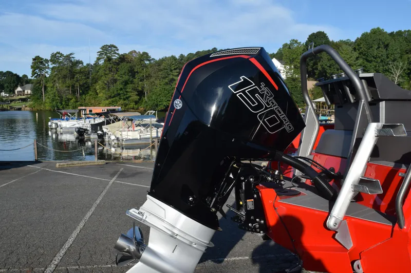 Slide: The Image of 2025 Stabicraft 2050 Treker Profish with powerful outboard motor at lakeside dock. - 3