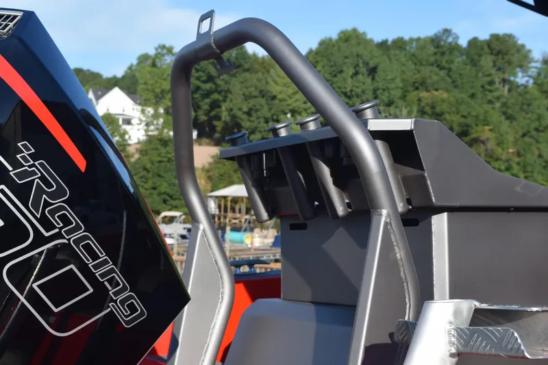 Slide: The Image of 2025 Stabicraft 2050 Treker Profish boat with powerful engine, docked near lush greenery. - 5