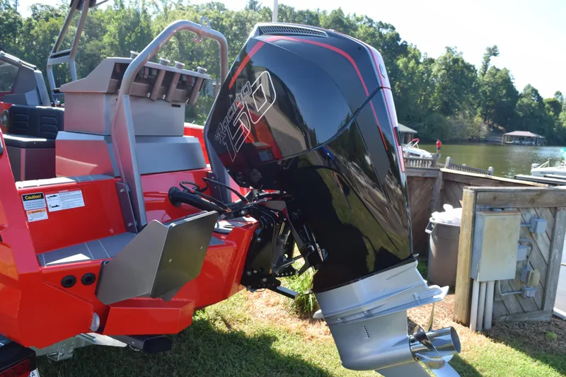 Slide: The Image of 2025 Stabicraft 2050 Treker Profish boat with powerful outboard motor by a lakeside. - 7