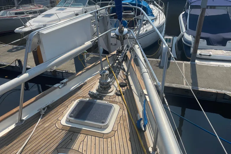 Slide: The Image of Deck of a 1984 Slocum 43 sailboat docked at a marina. - 3