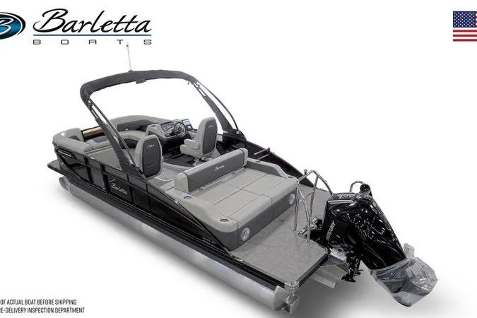 Slide: The Image of 2026 Barletta C22UC pontoon boat with sleek design and modern features, displayed in a showroom. - 4