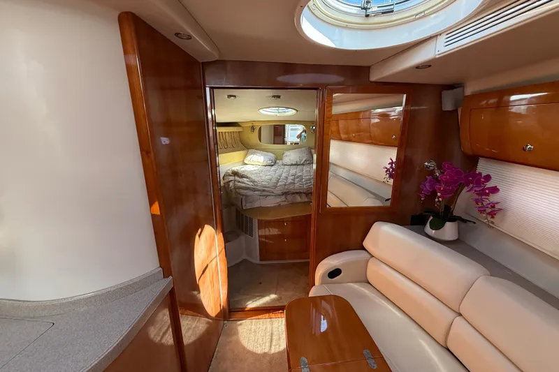 Slide: The Image of Luxurious interior of 2004 Regal Commodore 3860 yacht with cozy cabin and elegant furnishings. - 13