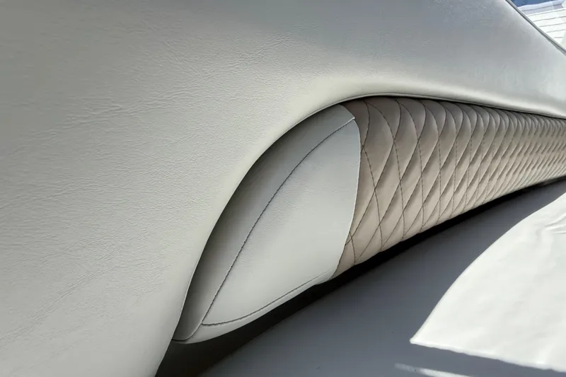 Slide: The Image of Close-up of 2004 Regal Commodore 3860's luxurious quilted leather interior. - 26