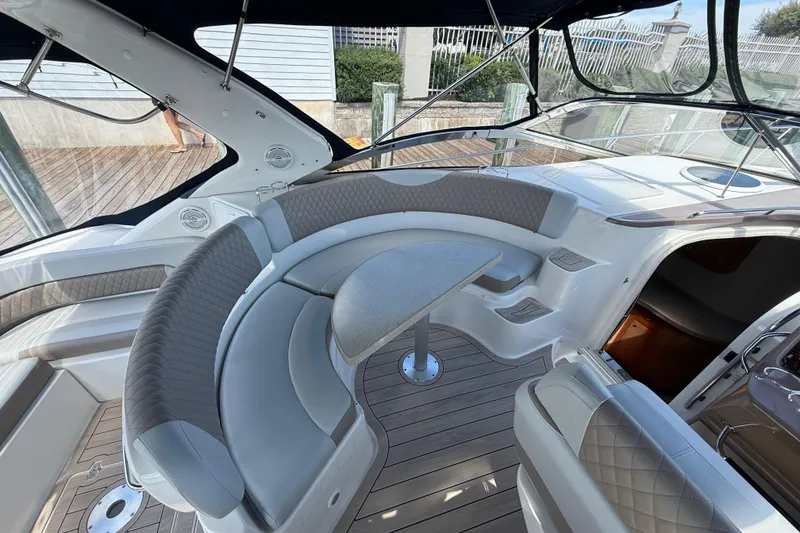 Slide: The Image of Luxurious 2004 Regal Commodore 3860 yacht interior with elegant seating and table. - 4