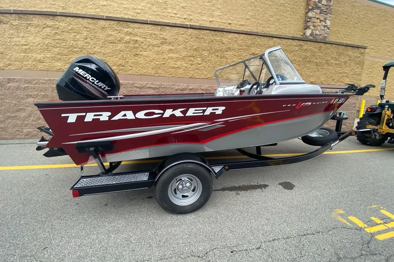 Slide: The Image of 2014 Tracker Pro Guide V-175 Combo boat with Mercury engine on trailer. - 3