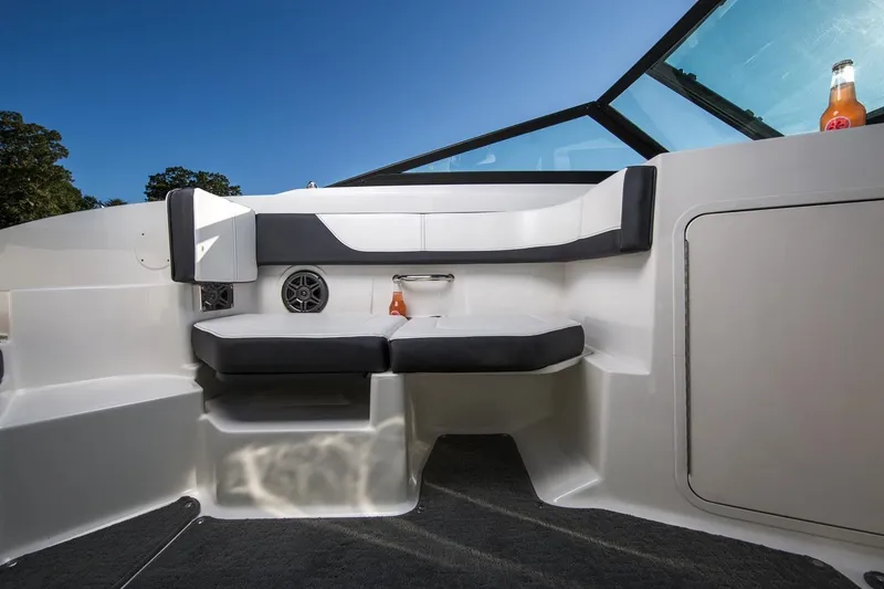 Slide: The Image of Manufacturer Provided Image: 2018 Sea Ray SPX 190 boat interior with seating and beverage holder. - 8