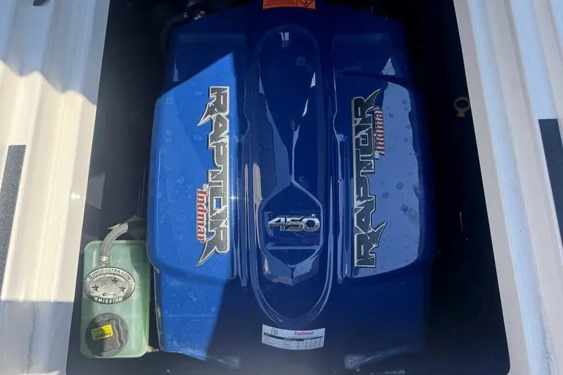 Slide: The Image of 2022 Moomba Mojo engine compartment featuring a Raptor Indmar 450 engine. - 3