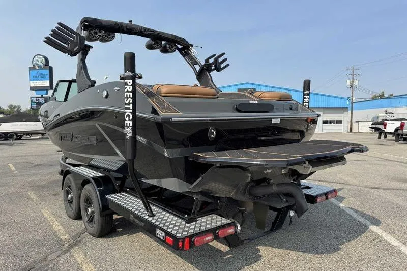 Slide: The Image of 2024 MB Alpha 23 boat rear view, featuring sleek design and modern features. - 7