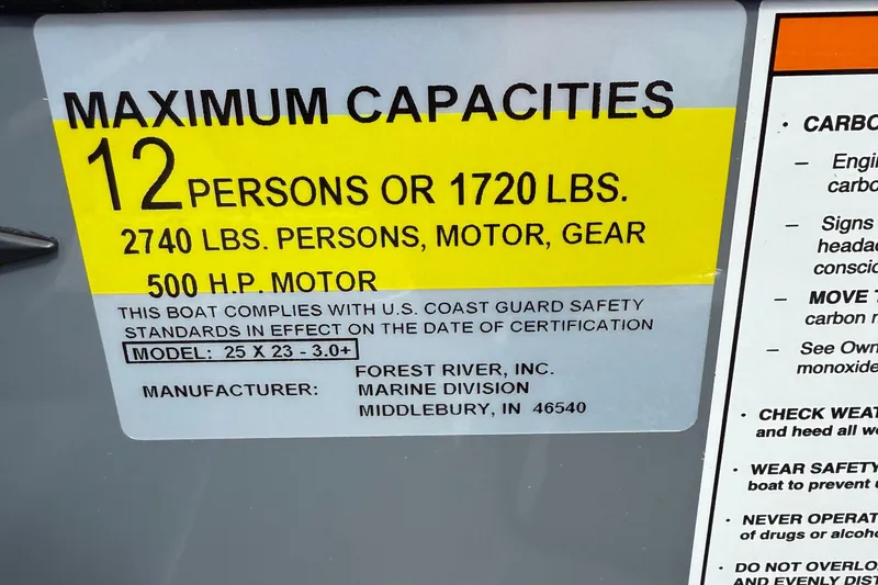 Slide: The Image of 2026 Berkshire 23RFX STS boat capacity label, 12 persons or 1720 lbs, 500 HP motor. - 13