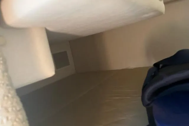 Slide: The Image of Interior cabin view of a 2006 Sea Ray 260 Sundancer boat. - 12