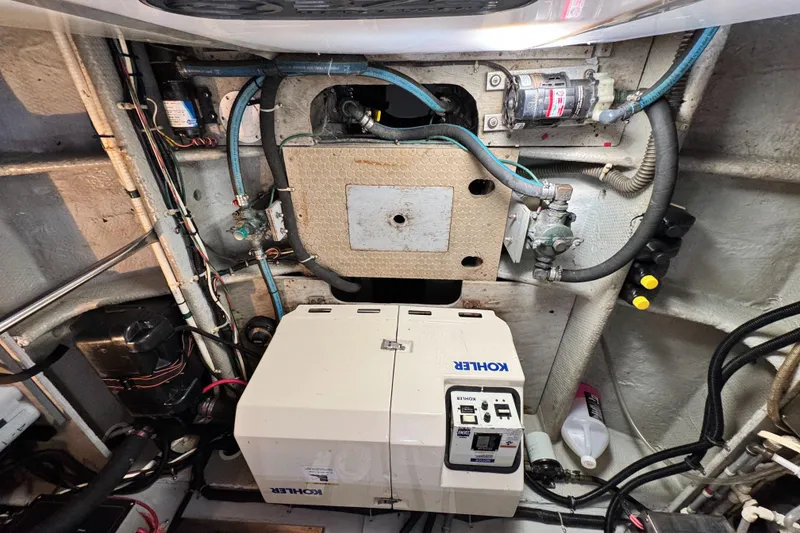 Slide: The Image of Engine room of a 1996 Silverton 372 Motor Yacht with Kohler generator. - 39