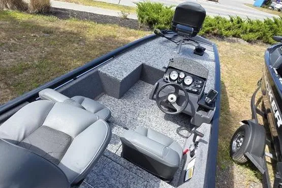 Slide: The Image of 2026 Tracker Pro 170 boat interior with steering console and seating. - 9