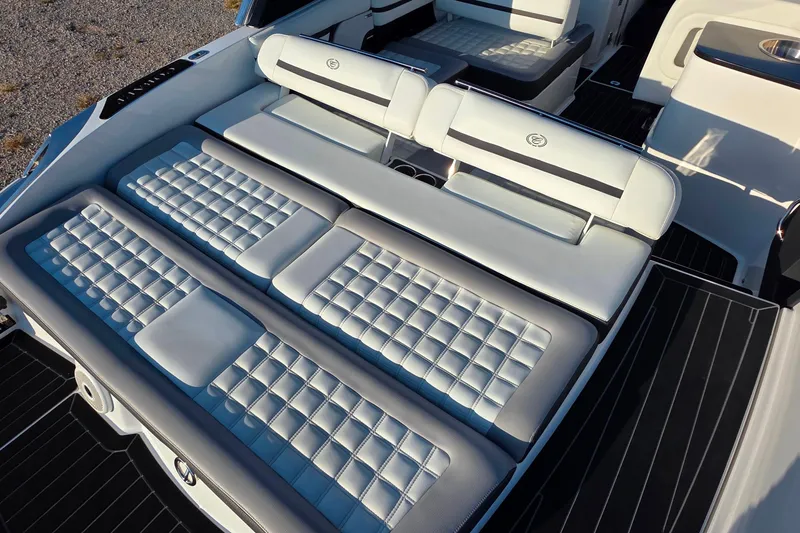 Slide: The Image of Luxurious seating on 2023 Cobalt R30 boat, featuring elegant white upholstery and modern design. - 22