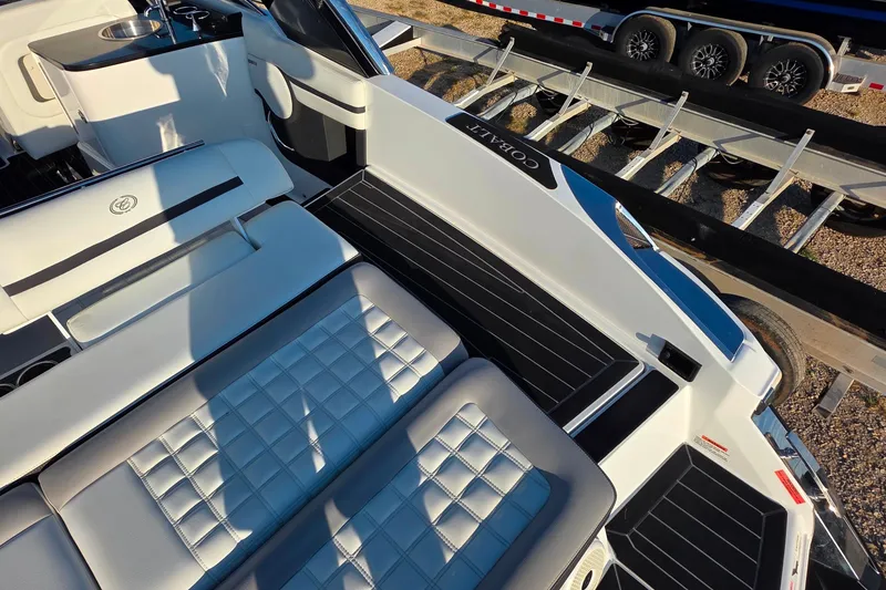 Slide: The Image of 2023 Cobalt R30 boat interior with luxurious seating and sleek design. - 24
