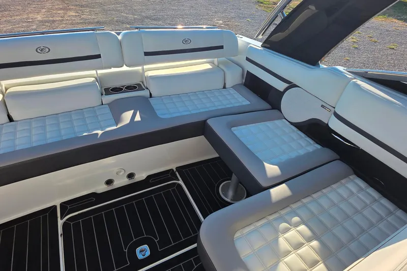 Slide: The Image of Luxurious interior of 2023 Cobalt R30 boat with plush seating and modern design. - 25