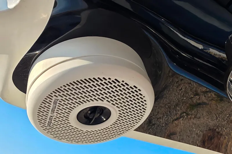 Slide: The Image of 2023 Cobalt R30 boat with Harman Kardon speaker, close-up view. - 33