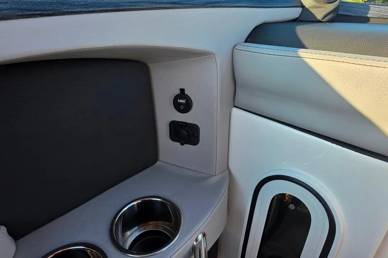 Slide: The Image of Interior of 2023 Cobalt R30 boat with USB port and cup holders. - 40
