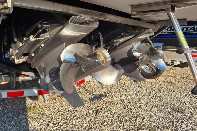 Slide: The Image of 2023 Cobalt R30 boat propellers on a trailer, showcasing dual stainless steel design. - 54