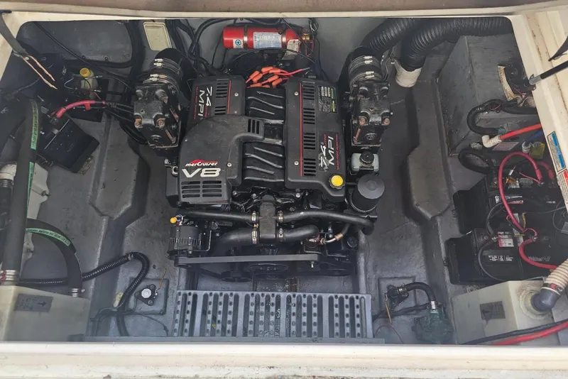 Slide: The Image of Engine compartment of a 1999 Sea Ray 270 Sundancer with MerCruiser V8 engine. - 4
