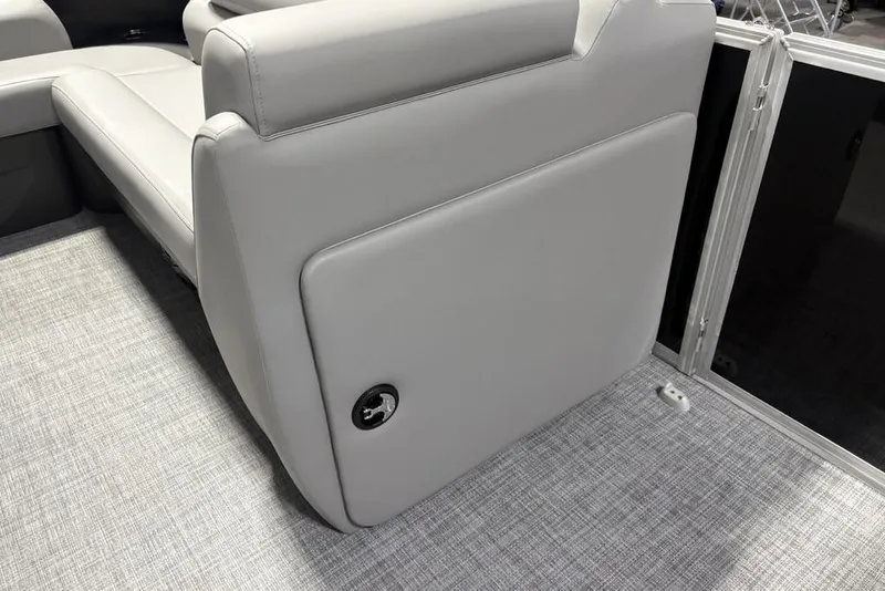 Slide: The Image of 2026 Sun Tracker PARTY BARGE® 20 DLX interior with gray seating and flooring. - 25