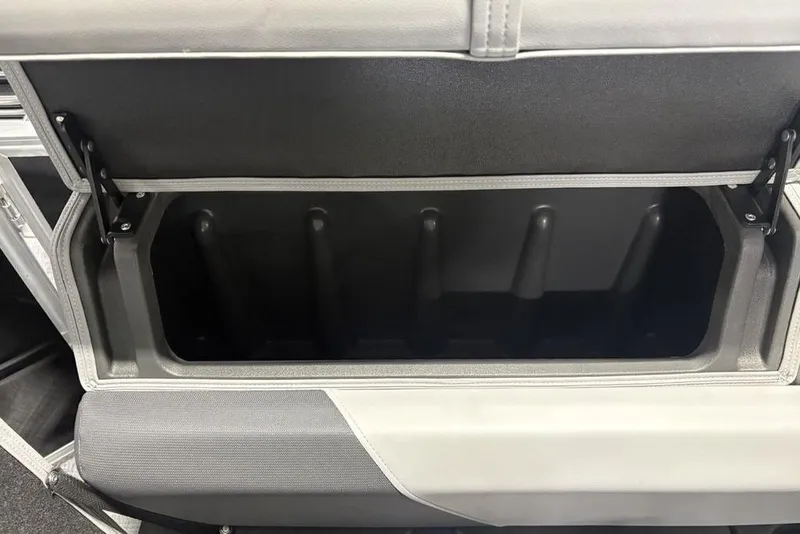 Slide: The Image of Open storage compartment in 2026 Sun Tracker PARTY BARGE® 20 DLX pontoon boat. - 30