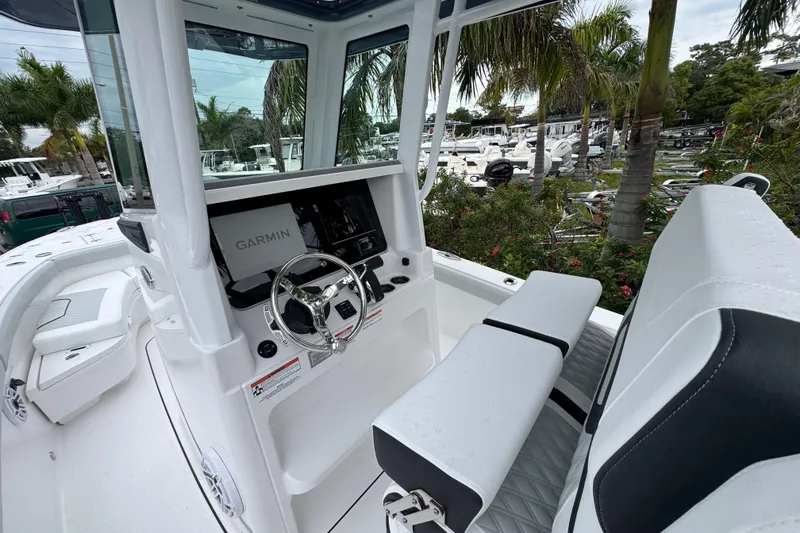 Slide: The Image of 2026 Blackfin 262 HB boat interior with Garmin navigation, sleek design, and comfortable seating. - 15