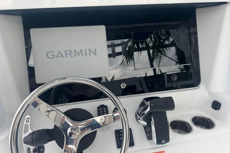 Slide: The Image of 2026 Blackfin 262 HB helm with Garmin navigation system and steering wheel. - 17