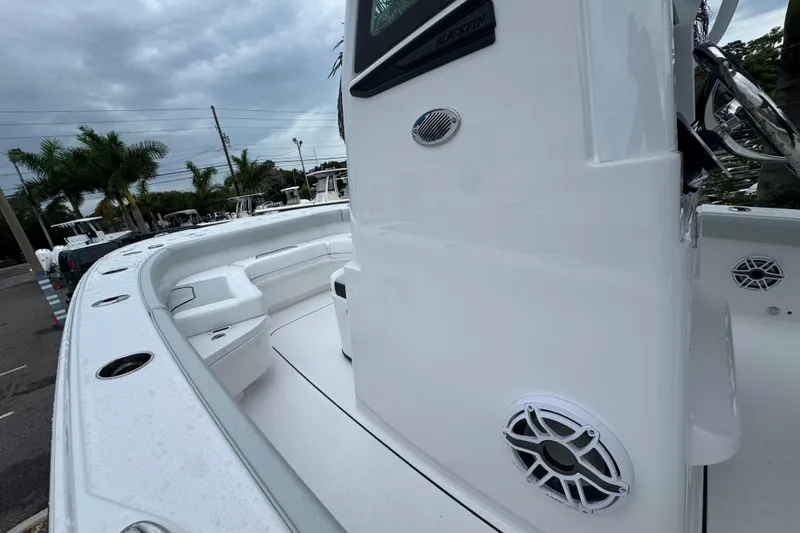 Slide: The Image of 2026 Blackfin 262 HB boat with sleek white deck and modern design. - 20