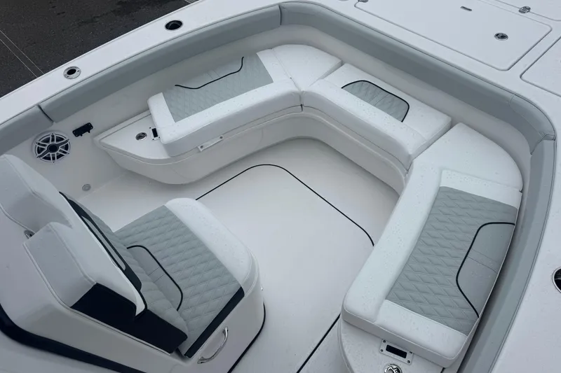 Slide: The Image of 2026 Blackfin 262 HB boat interior with cushioned seating and sleek design. - 30