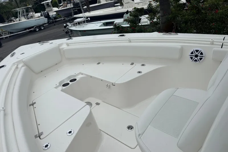 Slide: The Image of 2026 Key West 239 FS boat interior with seating and cup holders. - 19