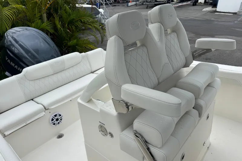 Slide: The Image of 2026 Key West 239 FS boat interior with luxurious seating and Yamaha engine. - 34