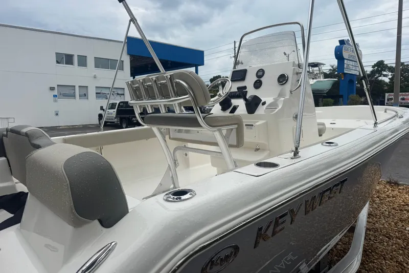 Slide: The Image of 2026 Key West 189 FS boat with sleek design, wet deck, and modern controls. - 5