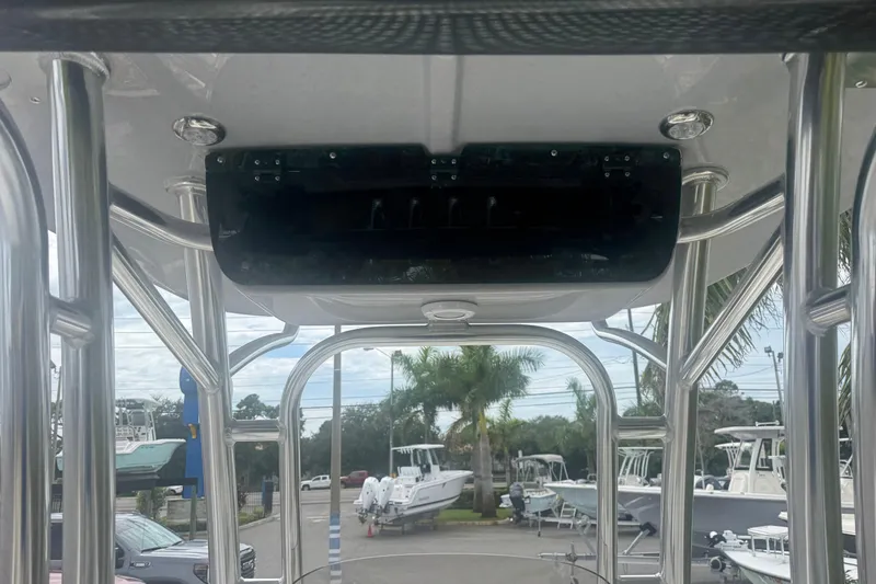 Slide: The Image of 2026 Key West 203 FS boat interior with stainless steel framework and overhead console. - 23