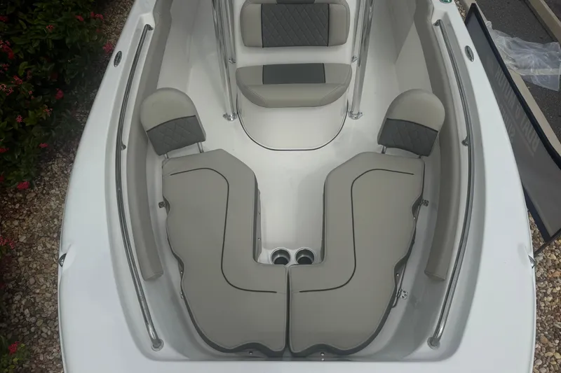 Slide: The Image of 2026 Key West 203 FS boat interior with cushioned seating and sleek design. - 29