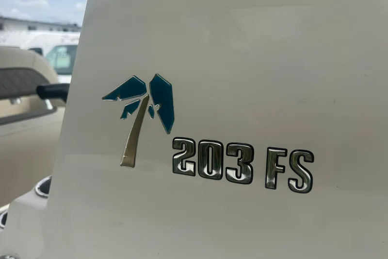 Slide: The Image of Key West 203 FS 2026 model logo on boat exterior. - 33