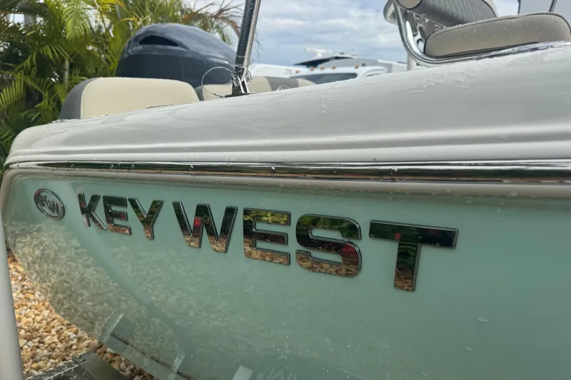 Slide: The Image of 2026 Key West 189 FS boat with sleek design and chrome lettering. - 7