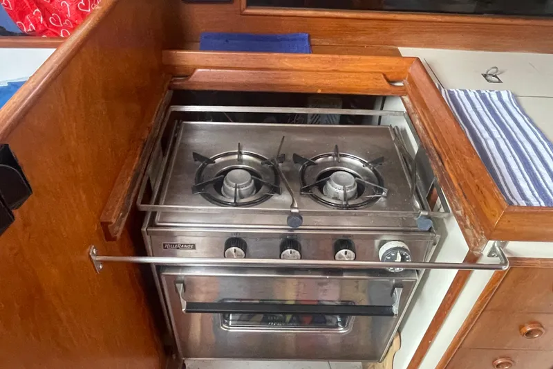 Slide: The Image of Stainless steel stove in 1983 Nonsuch 30 Classic yacht kitchen. - 15