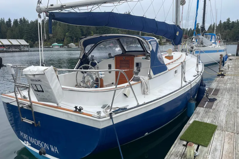 Slide: The Image of 1983 Nonsuch 30 Classic sailboat docked at Port Madison, WA. - 2