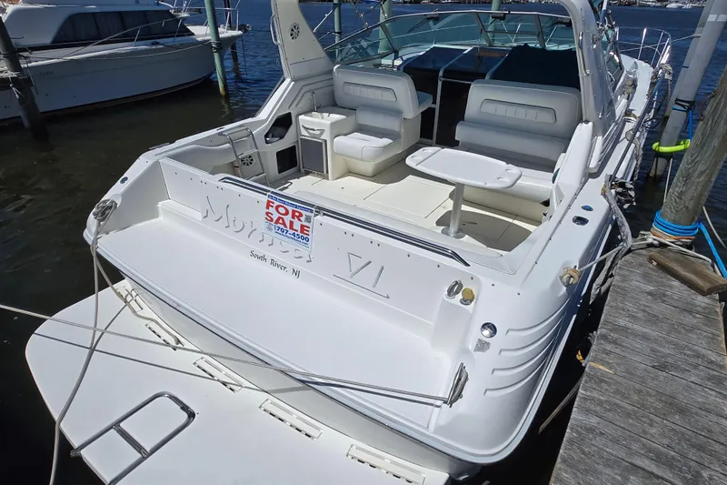 Slide: The Image of 1994 Sea Ray 400 Express Cruiser for sale, docked at marina. - 19