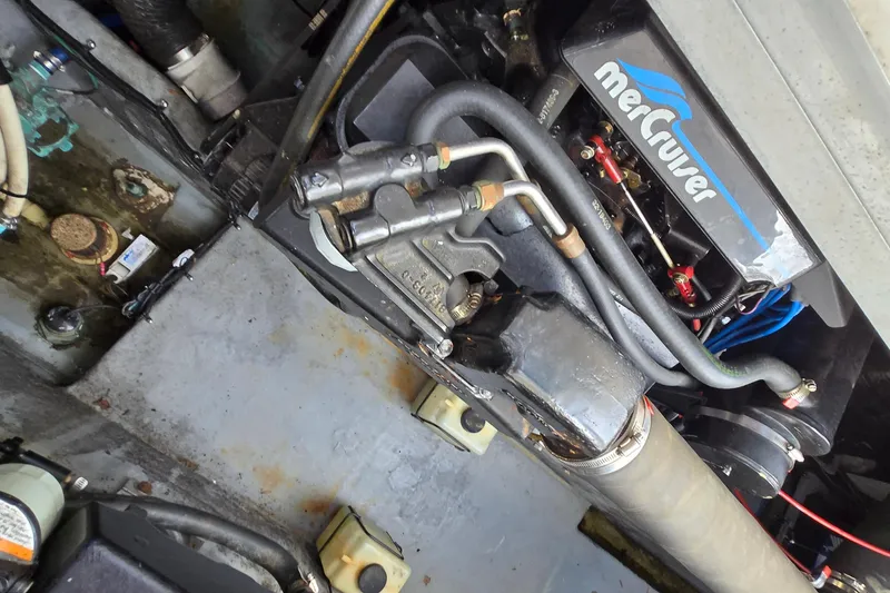 Slide: The Image of Engine compartment of a 1994 Sea Ray 400 Express Cruiser with MerCruiser components. - 35