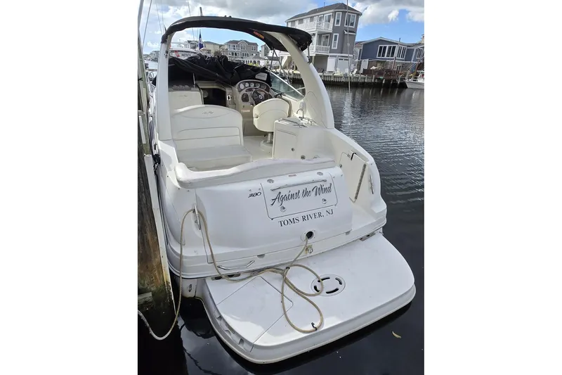 Slide: The Image of 2006 Sea Ray 280 Sundancer docked in Toms River, NJ, rear view. - 2