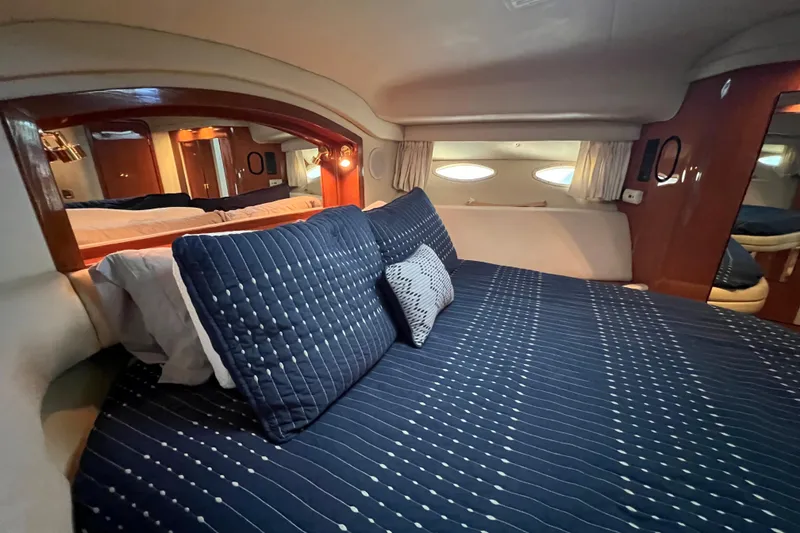 Slide: The Image of Luxurious cabin interior of 2000 Sea Ray 400 Sedan Bridge yacht. - 118