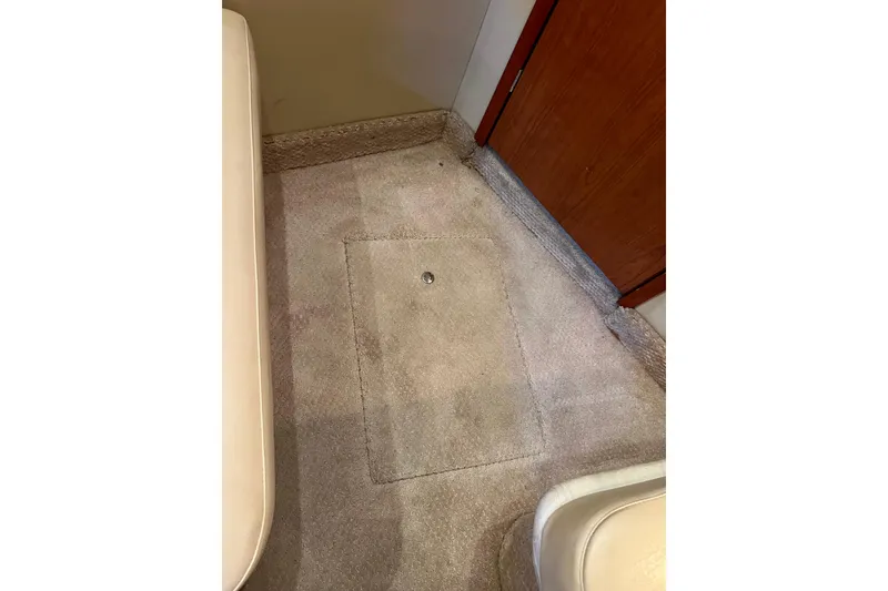 Slide: The Image of Carpeted interior of a 2000 Sea Ray 400 Sedan Bridge yacht. - 132