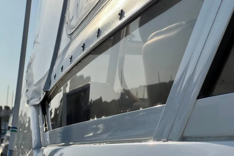 Slide: The Image of Close-up of 2000 Sea Ray 400 Sedan Bridge yacht window detail. - 36