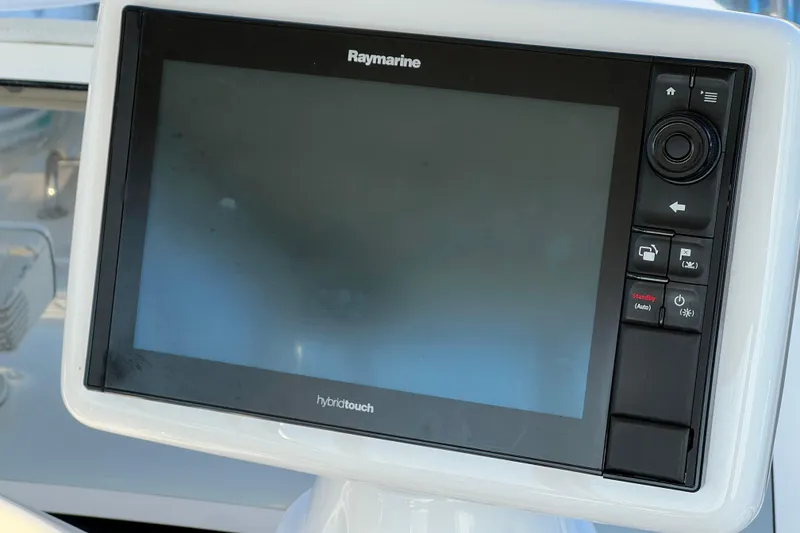 Slide: The Image of Raymarine hybrid touch display on 2000 Sea Ray 400 Sedan Bridge yacht. - 58