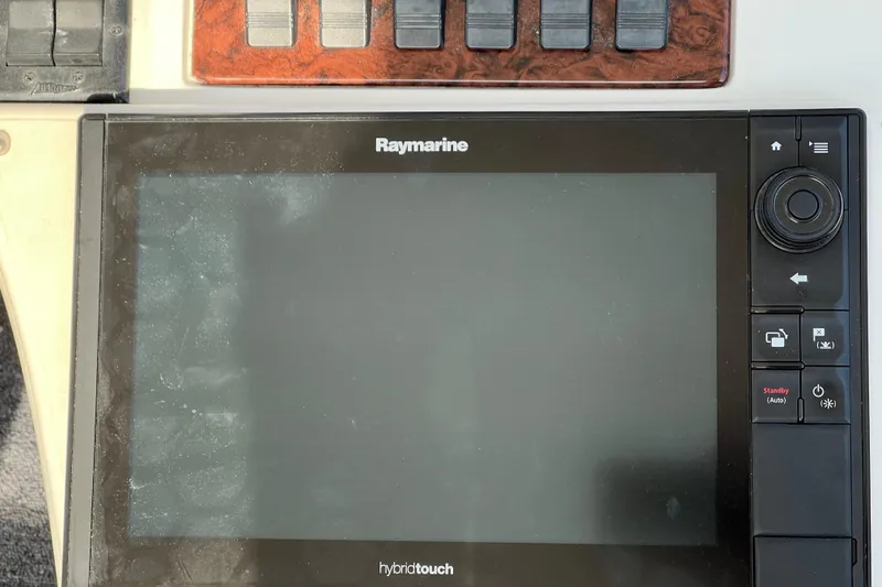Slide: The Image of Raymarine hybridtouch display on 2000 Sea Ray 400 Sedan Bridge yacht dashboard. - 59