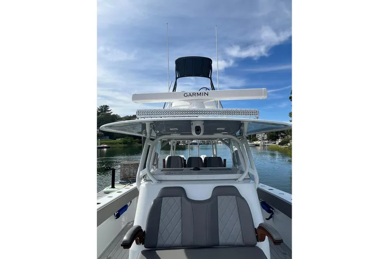 Slide: The Image of Freeman 42 LR 2025 boat with Garmin equipment, docked on a sunny day. - 35